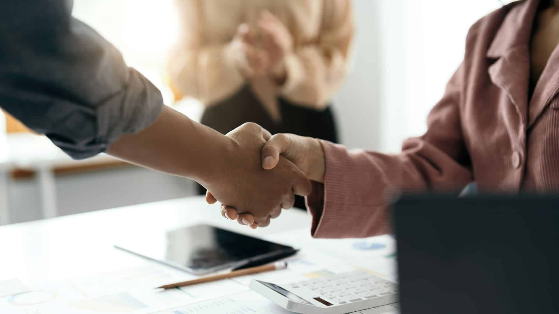 Two men discussing how to avoid probate without a trust during an estate planning consultation.